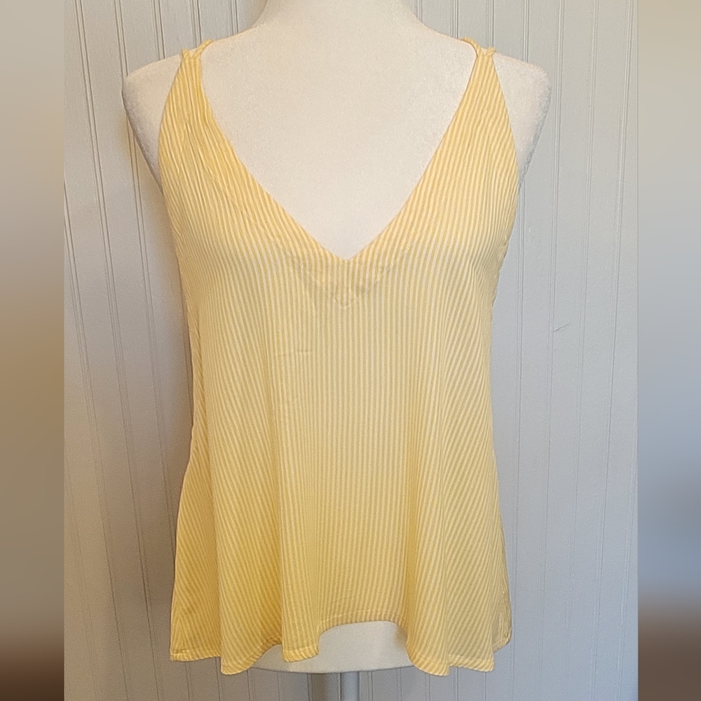 Lulus size large yellow and white striped tank top with tie in the back.